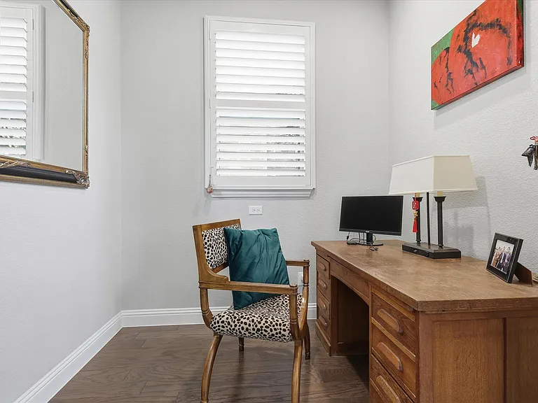 Convenient downstairs office nook provides a quiet remote workspace just steps from the main living areas.