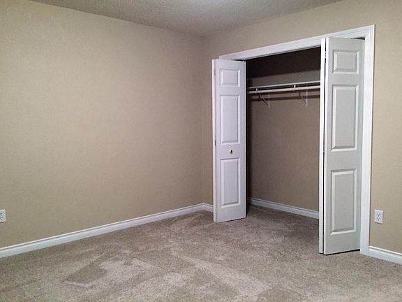 Great sized main floor living room with large windows overlooking the Front Porch.  Open concept.  New carpet and freshly painted woodwork.  A must see for any family.