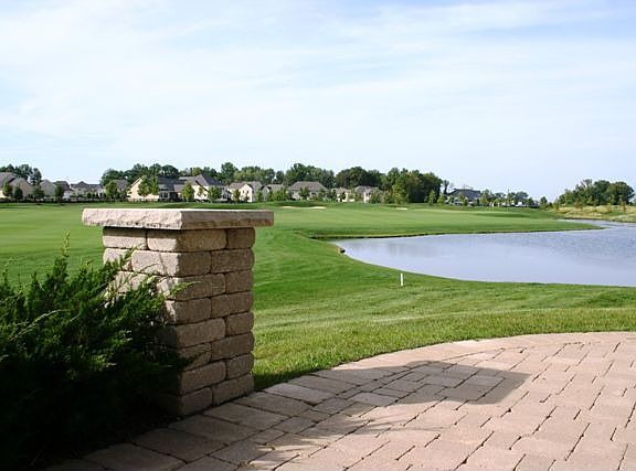 Golf course and pond views from your Paver patio.