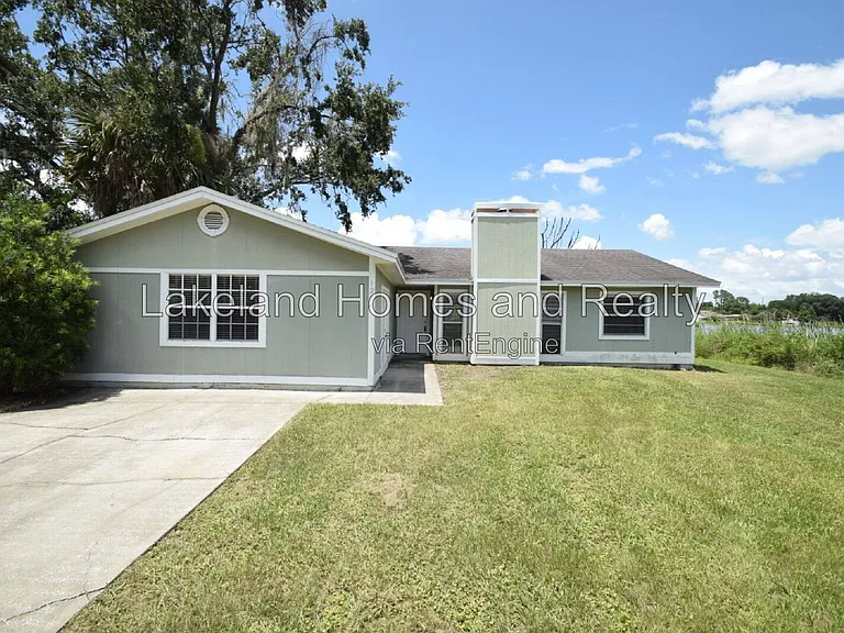 1204 Honeytree Ln W — Photo 3
