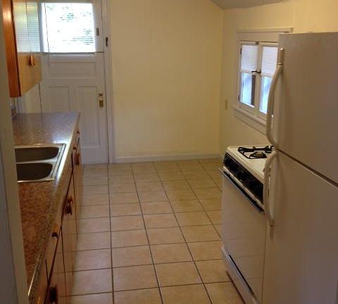 Kitchen. Gas Stove. Great balcony overlooking backyard.