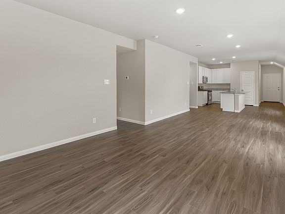 Family Room to Kitchen and Dining Area