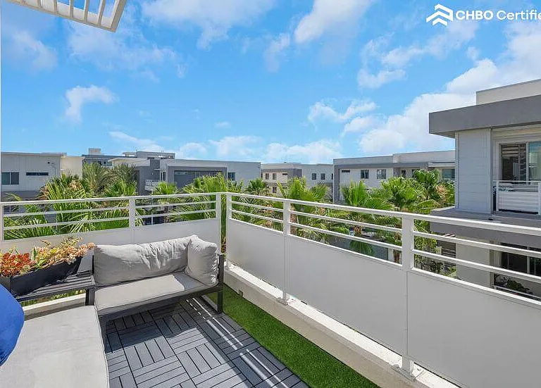 Views and sun for days on this top-floor patio deck