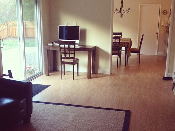 Den leading into kitchen