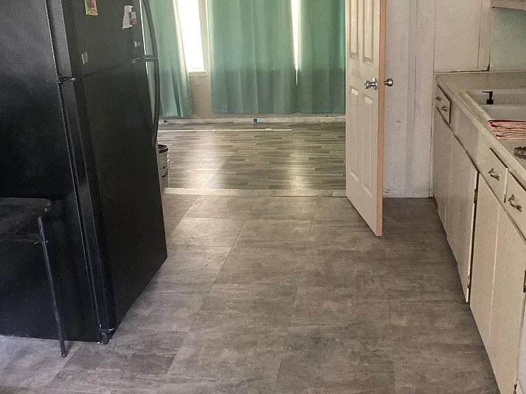 double doors leading to main room from kitchen