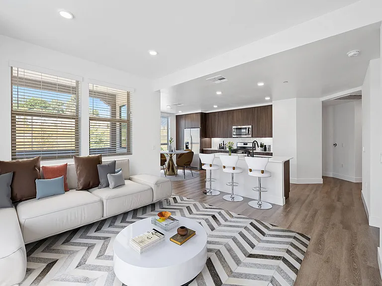 Enjoy an open concept floor plan with large, inviting windows that fill your space with natural light.