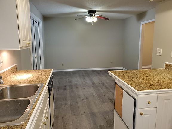 Dining room leading to the covered and screened balcony