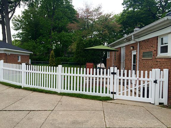 Fully fenced in back yard with patio
