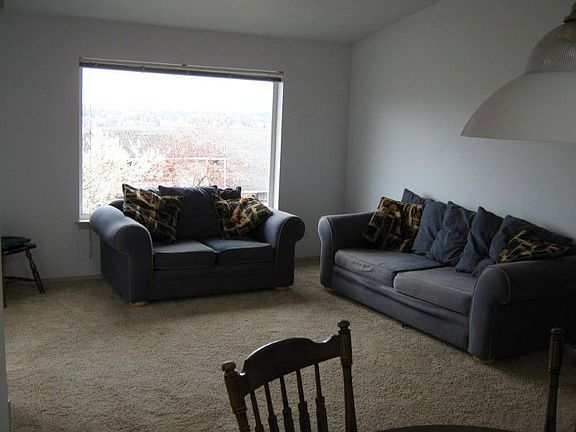 Living room with furnishings included at no extra cost.