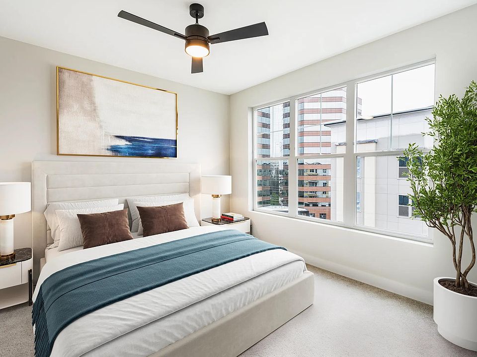 Spacious bedrooms with large windows for bright, airy living.