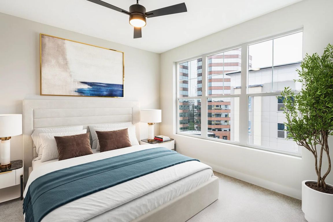 Spacious bedrooms with large windows for bright, airy living.