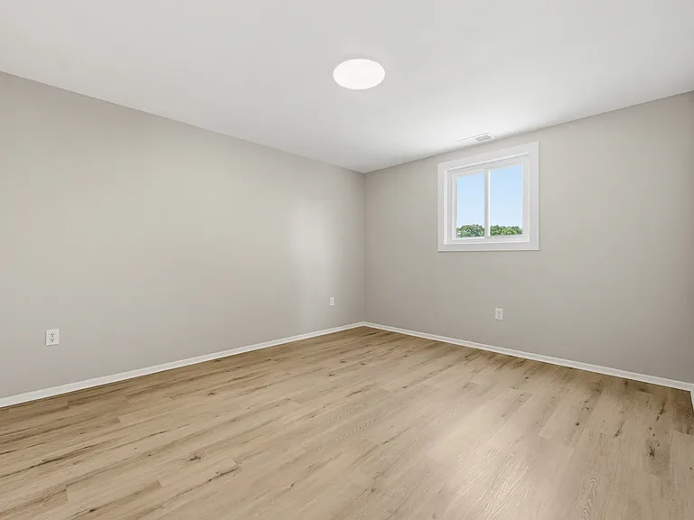 Primary bedroom. LED light has a night light feature!