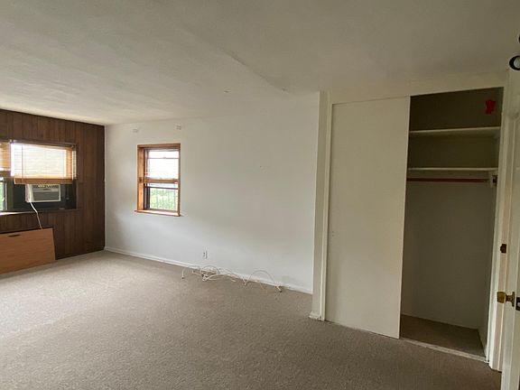 Master bedroom showing closet.