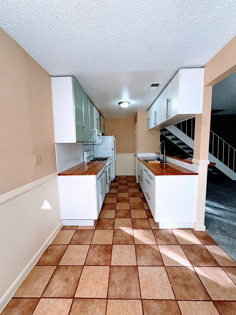Nicely Updated Two Story Fourplex Unit in Auburn- On site Laundry — Photo 2