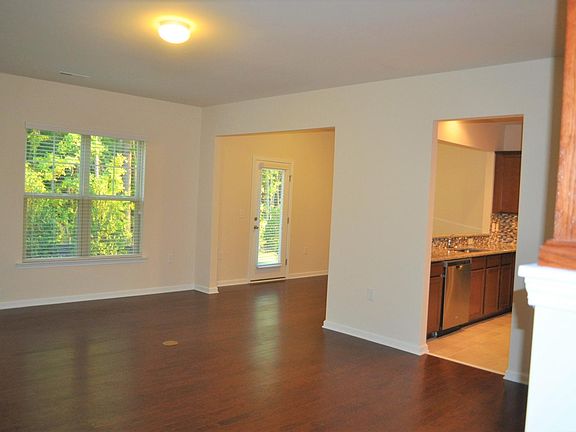 Living Room showing Kitchen and Dining Area