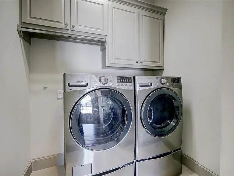 The utility room is conveniently located on the third floor with the primary suite.