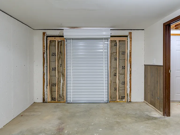 The basement roll door.