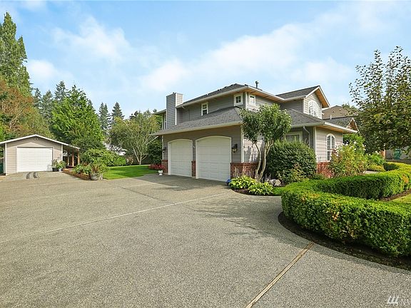 4 covered parking spaces. RV Parking plus room for all the Toys!