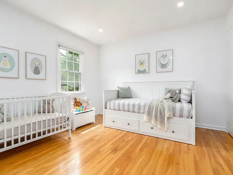 One of the 4 bedrooms on the second floor. Virtually staged.