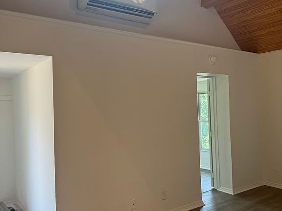 Living room equipped with mini split for source of heat and air