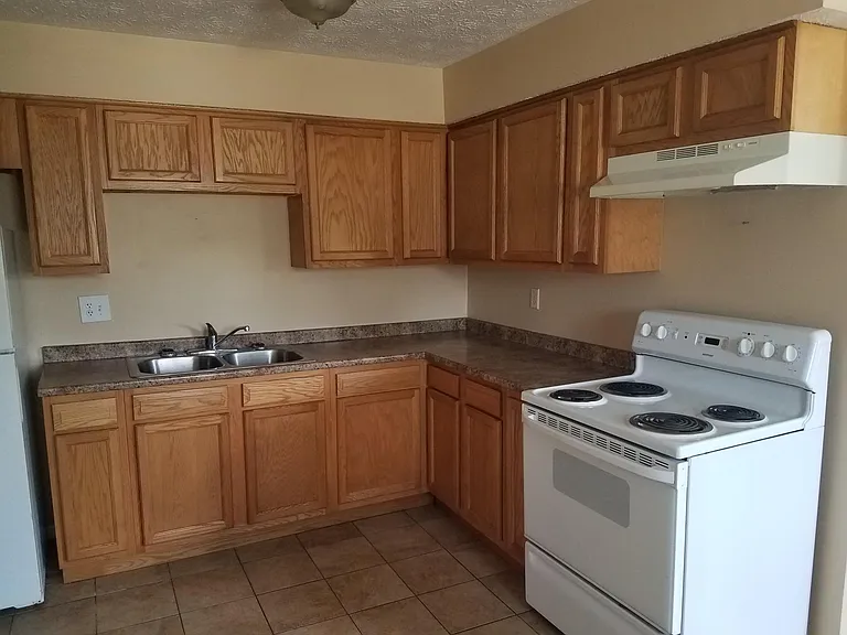 Kitchen with new sink and faucet