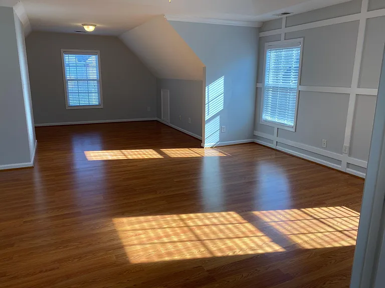 The oversized master bedroom provides extra space for a nursery or home office if desired.