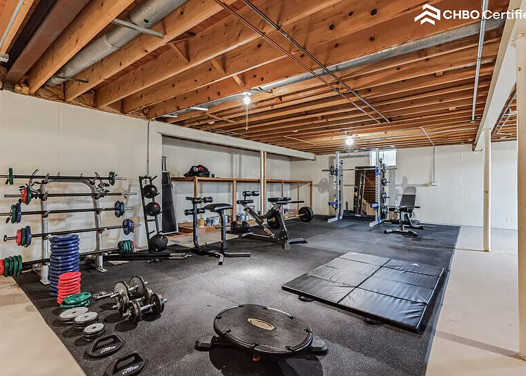 Gym - complete with squat rack & barbells, free weights, etc