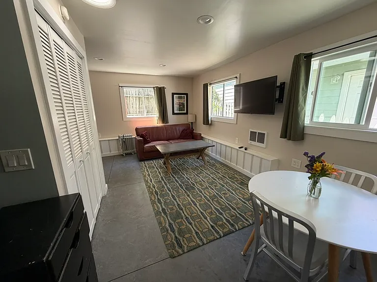 Dining table looking toward living area/couch.
