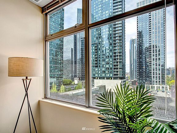 Large windows showing amazing unobstructed city views.