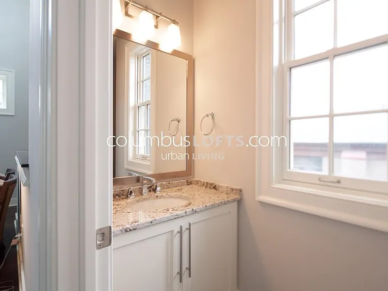powder room (half bathroom) on main level next to living room