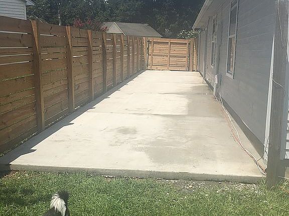 Side patio added, new fence