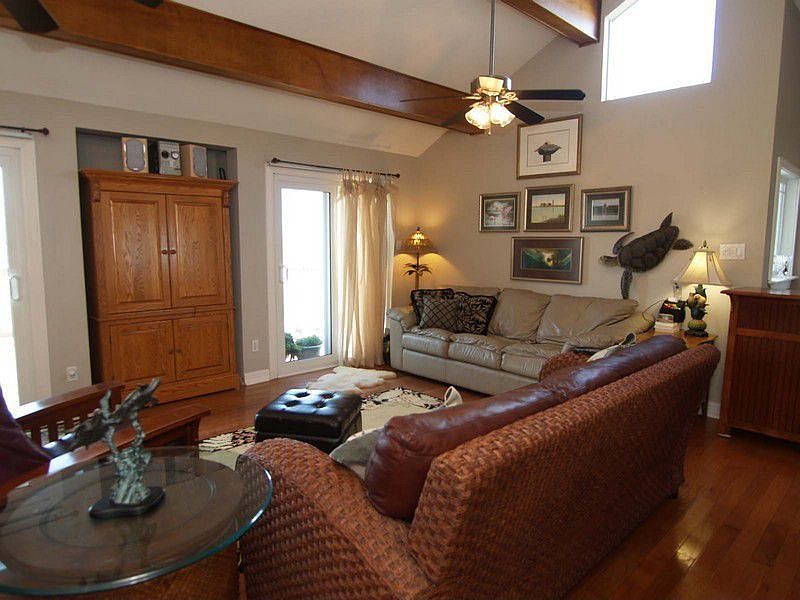 Living room from hallway, showing large doors
