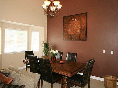The dining room is large with plenty of room for a table of 10