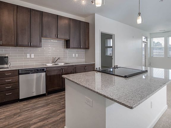 Kitchen with Stainless Steel Appliances and Breakfast Bar