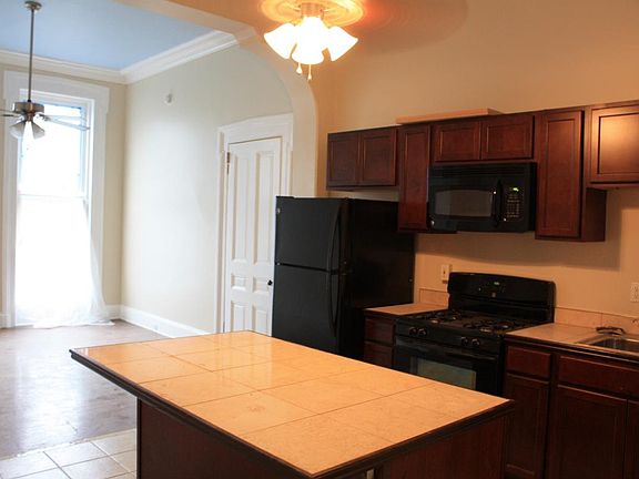 Kitchen with View of Living Room (notice the large front win