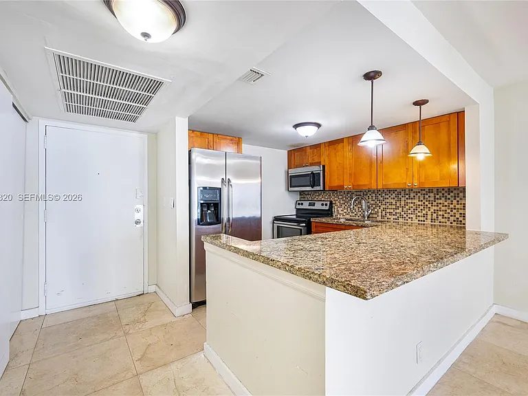 601 Three Islands Blvd #112 — Photo 3