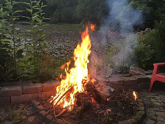 Pond side patio with firepit