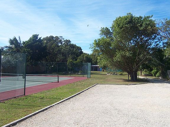 Tennis court and parking area