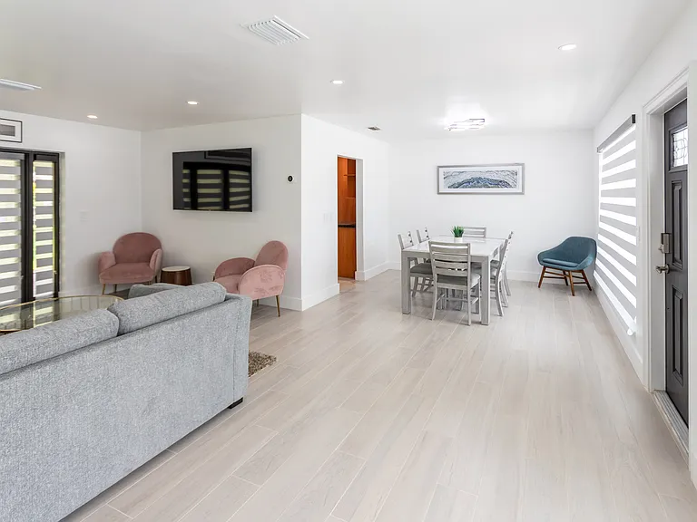 living room with dining area in the background
