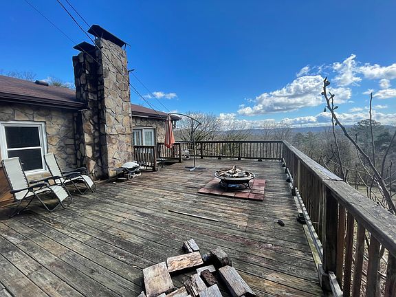 Photo of large deck off the living room. Gorgeous views of missionary ridge and chattanooga valley. Deck has been repaired and stained since this photo.