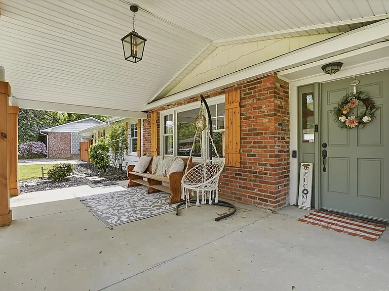 The home has a large and beautiful front porch.