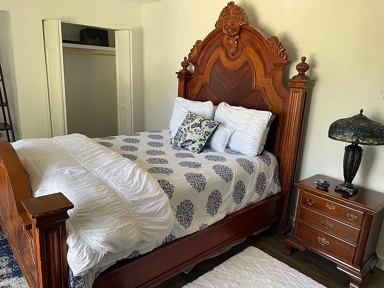 Antique bed and beautiful furnishings.