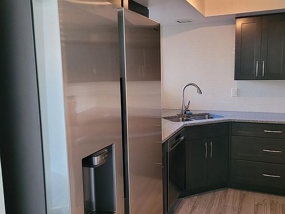 Brand New refrigerator with water in the door and ice maker