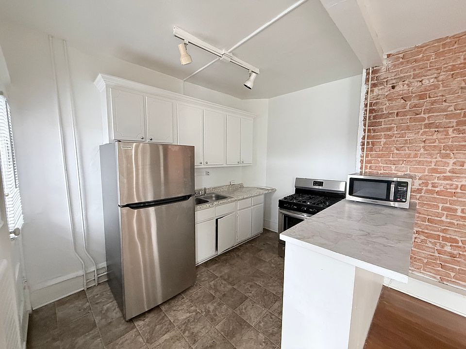 Kitchen with gas range and gas included in rent