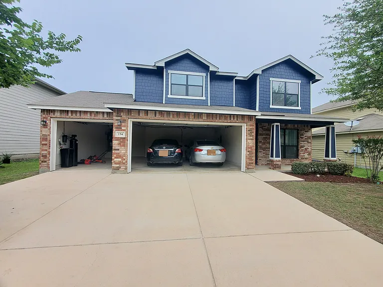 3 Car Garage with long driveway
