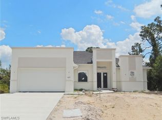 409 Columbus Blvd, Lehigh Acres, FL 33974