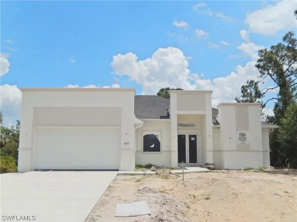 409 Columbus Blvd, Lehigh Acres, FL 33974
