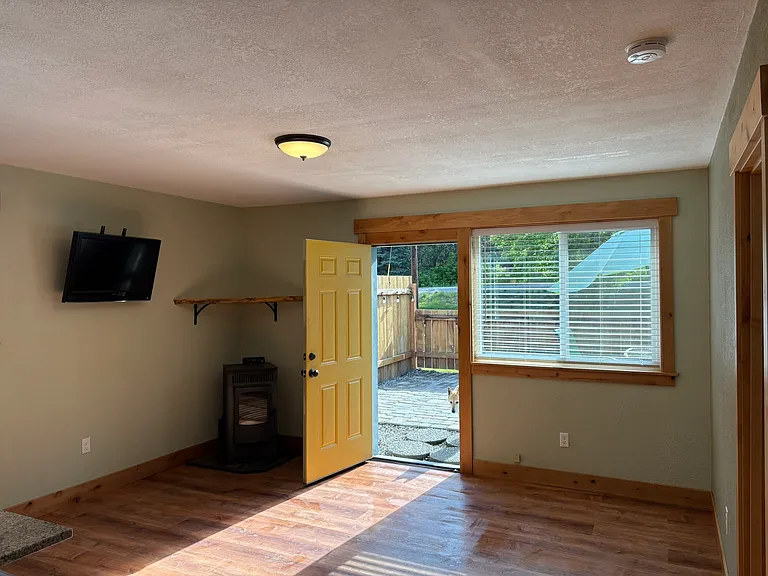 living room, door to patio
