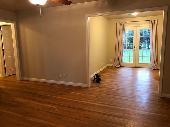View of living and dining from front door