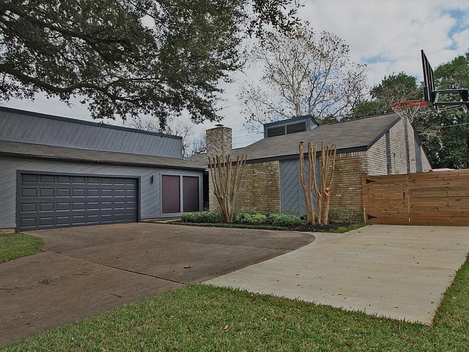 Home has large driveway and basketball hoop. Easy landscaping.
